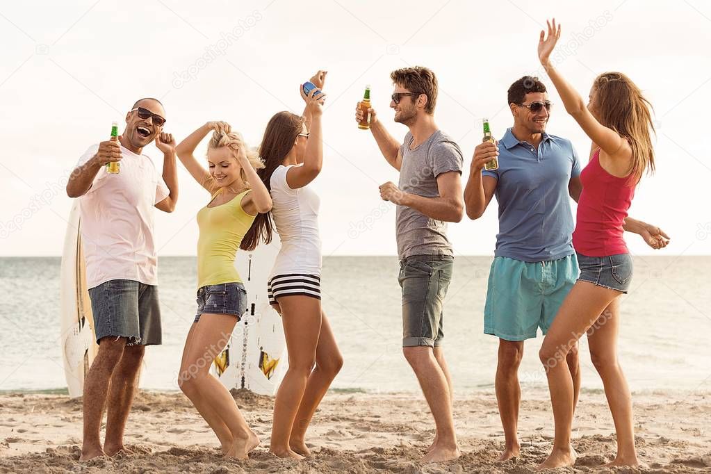 friends partying at the beach 