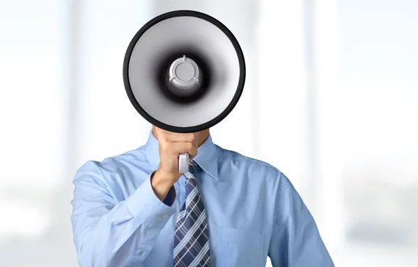 Uomo d'affari con megafono — Foto Stock