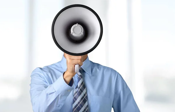 Homem de negócios com megafone — Fotografia de Stock