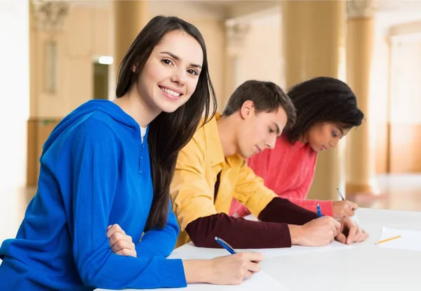 Students sitting in classroom — Stock Photo, Image