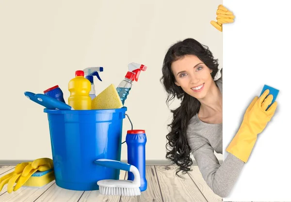 Cleaning woman showing sign poster — Stock Photo, Image