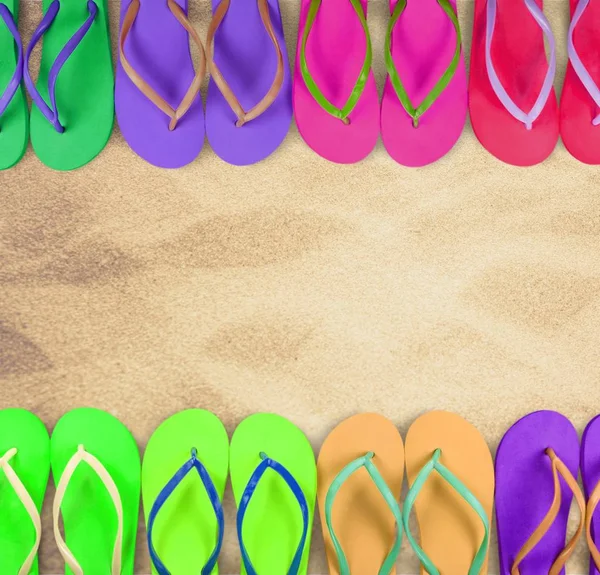 Chanclas en la playa — Foto de Stock