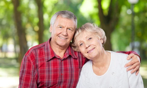 Elderly couple hugging — Stock Photo, Image