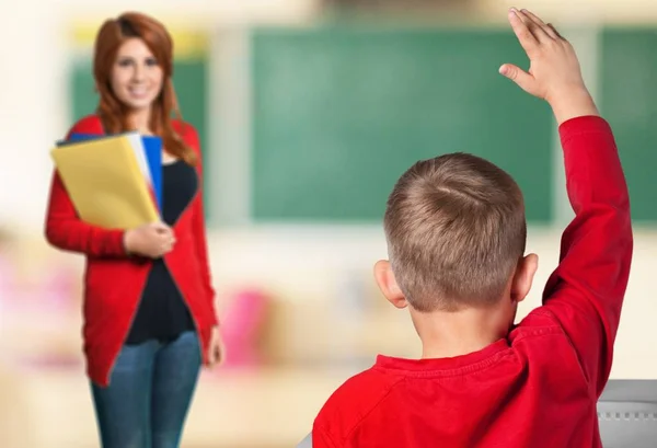 Maestra y niño en la lección — Foto de Stock