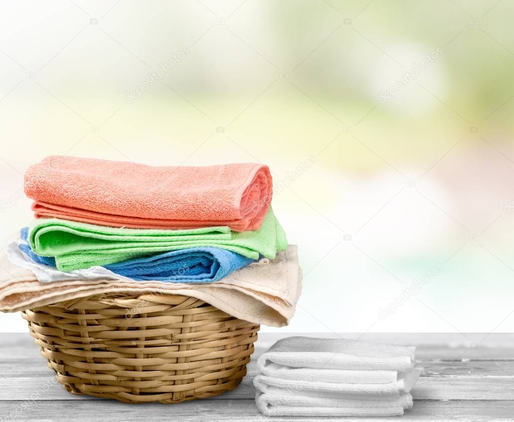 Laundry Basket with colorful towels — Stock Photo © billiondigital