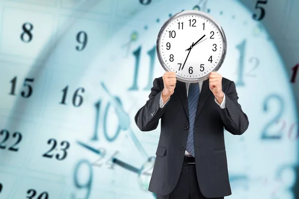 Businessman holding Clock — Stock Photo, Image