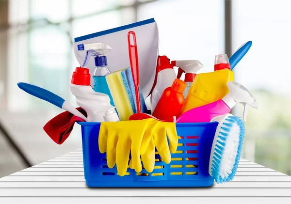 cleaning supplies in basket