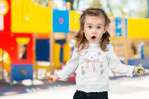 Adorable happy surprised little girl child