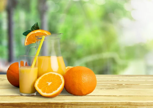 Glass of delicious orange juice — Stock Photo, Image