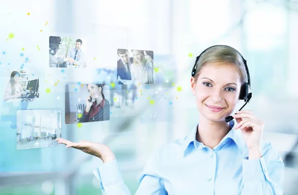 Young businesswoman in headset — Stock Photo, Image