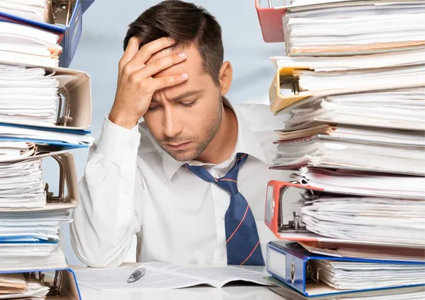 Overworked manager at workplace — Stock Photo, Image