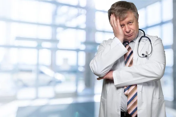 Portrait of overworked doctor — Stock Photo, Image