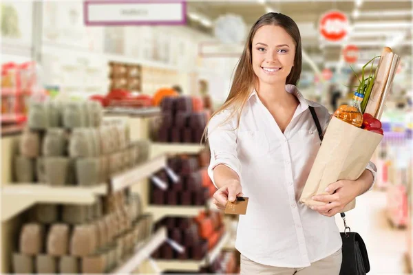 Young woman in grocery shop — Stock Photo, Image
