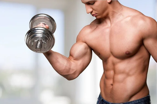 Sporty man work out with dumbbell — Stock Photo, Image