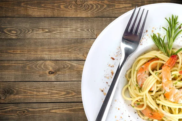 Pasta with prawns in white plate — Stock Photo, Image