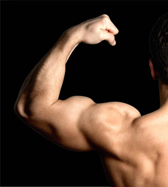 Close up on bodybuilder bicep — Stock Photo, Image