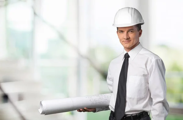 Architect holding blueprint — Stock Photo, Image