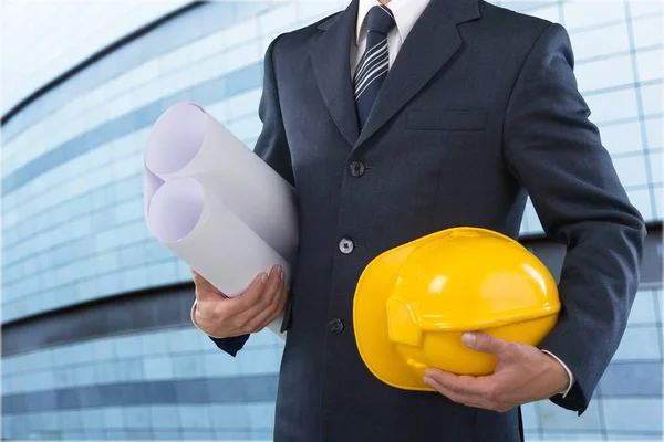 Construction worker man holding in  blueprint — Stock Photo, Image