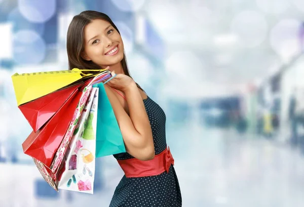 Young woman with shopping bags — Stock Photo, Image
