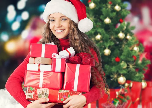 Young girl with christmas gifts — Stock Photo, Image