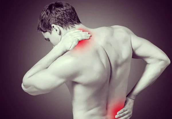 Man with neck and back pain — Stock Photo, Image