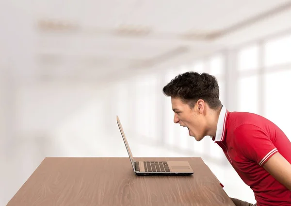 Student man med laptop — Stockfoto