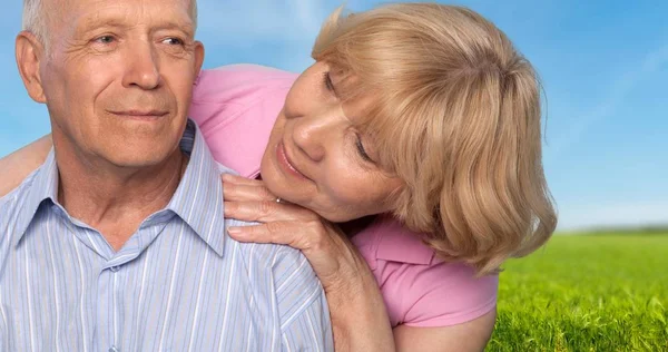 elderly couple in park