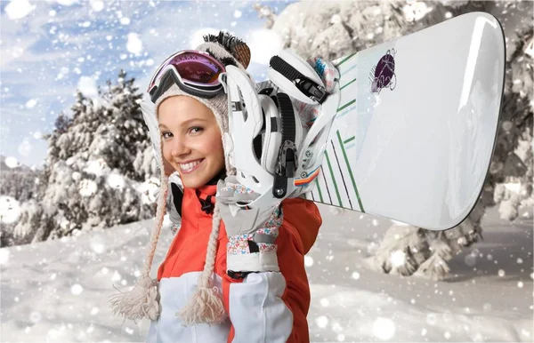 Gelukkig jonge vrouwelijke snowboarder — Stockfoto