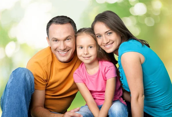 Happy smiling family with daughter — Stock Photo, Image