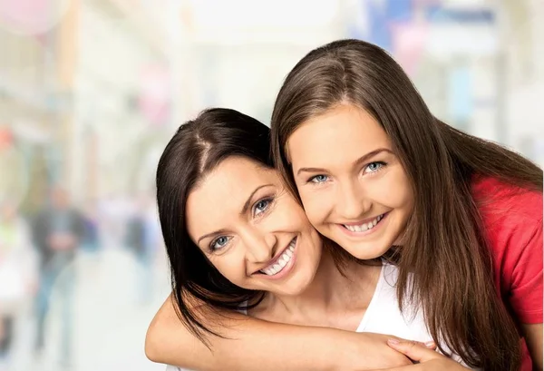 Young woman with girl — Stock Photo, Image
