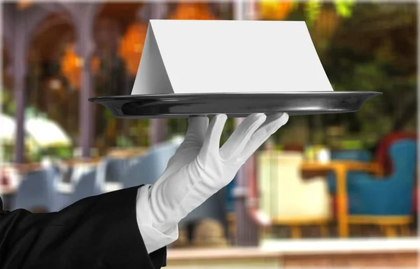 Waiter holding a note card — Stock Photo, Image