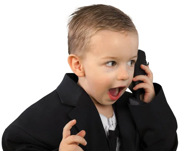 Little Boy Business Suit Cell Phone Stock Image
