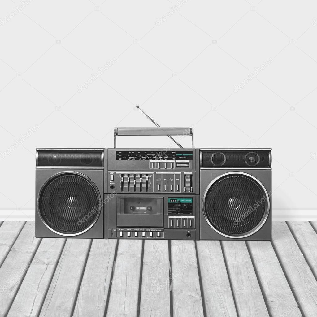 Old retro blaster cassette tape recorder on table