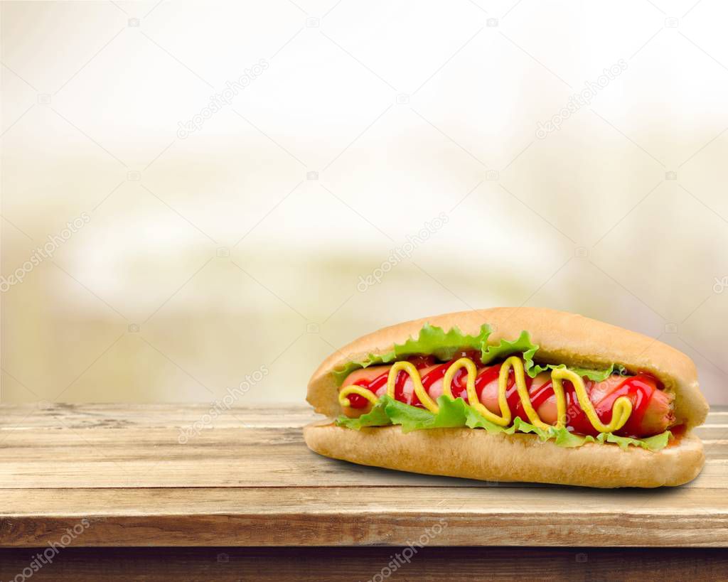 tasty hot dog with mustard