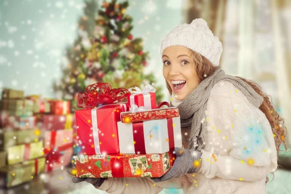 Young girl with christmas gifts — Stock Photo, Image