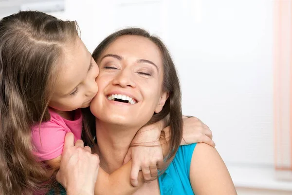 Young woman with little girl — Stock Photo, Image