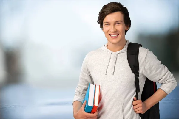 Estudante do sexo masculino com mochila — Fotografia de Stock