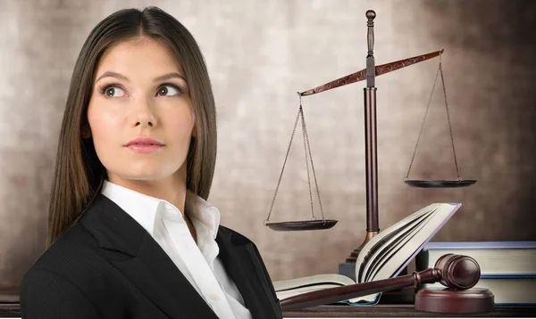 Scales of justice and businesswoman — Stock Photo, Image