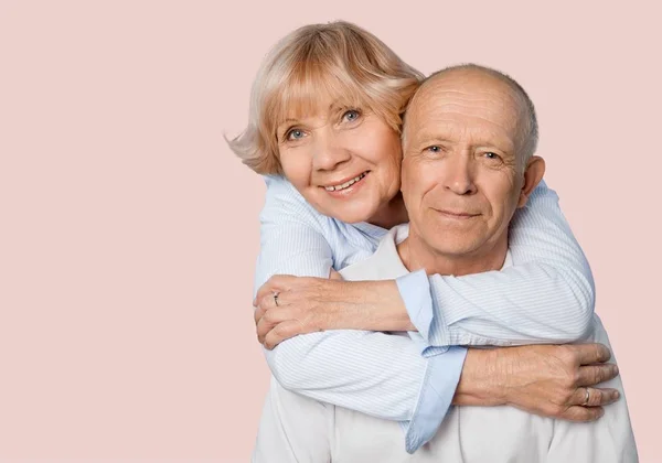 Elderly couple hugging — Stock Photo, Image