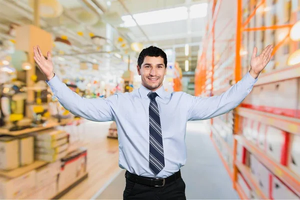 Young businessman at warehouse — Stock Photo, Image