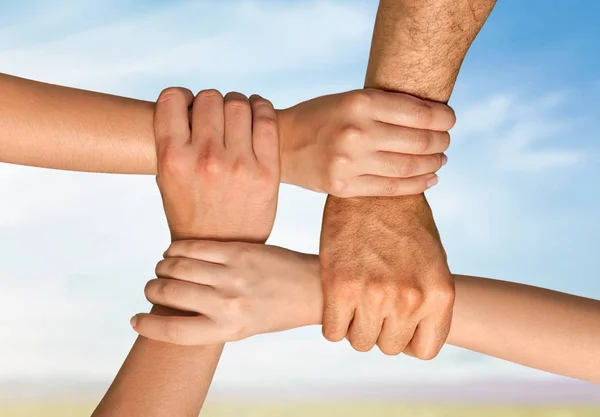 People stacking hands — Stock Photo, Image