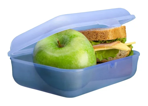 Μεσημεριανό σε πακέτο με ένα μήλο που απομονώνεται — Φωτογραφία Αρχείου