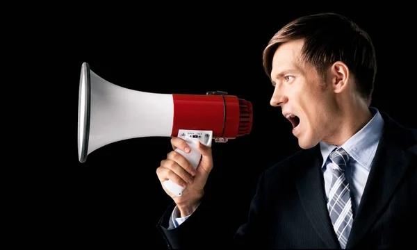 Homem de negócios com megafone — Fotografia de Stock