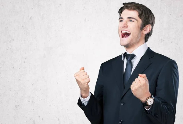 Guapo hombre de negocios usando traje — Foto de Stock