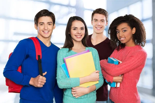 Grupo de estudiantes con libros — Foto de Stock