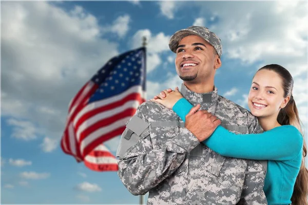 Soldier hugging his wife — Stock Photo, Image