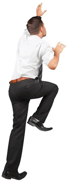 Young Businessman climbing — Stock Photo, Image