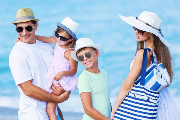 Happy family on vacations — Stock Photo, Image