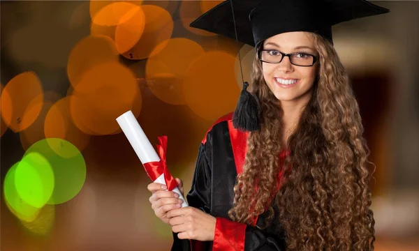 Jovem estudante graduado feminino — Fotografia de Stock