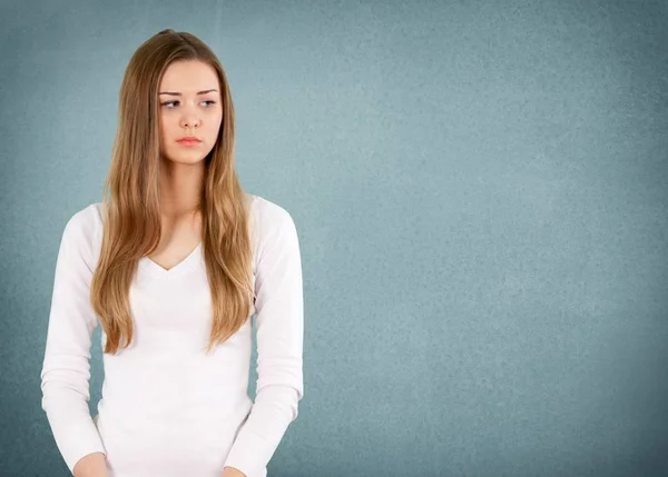 woman thinking and looking worried